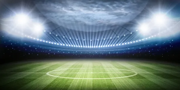 A soccer field with lights on the side of it.